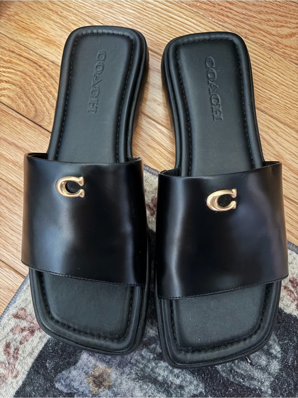 Coach Black Slide Sandals with Gold 'C' Accent - Picture 2 of 3